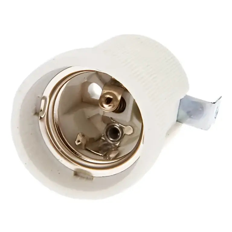 White ceramic lamp holder base with brass prongs for bedroom lighting