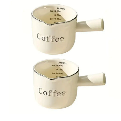 White ceramic measuring cups with silver rim – kitchen espresso tools