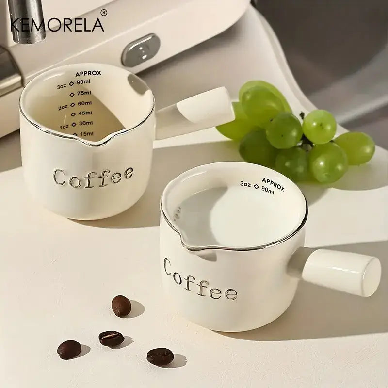 White ceramic measuring cups with silver rim – kitchen espresso tools