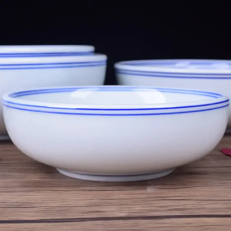 White ceramic noodle bowl with blue rim dining room tableware
