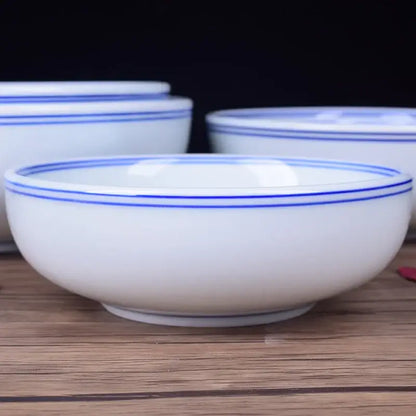 White ceramic noodle bowl with blue rim dining room tableware
