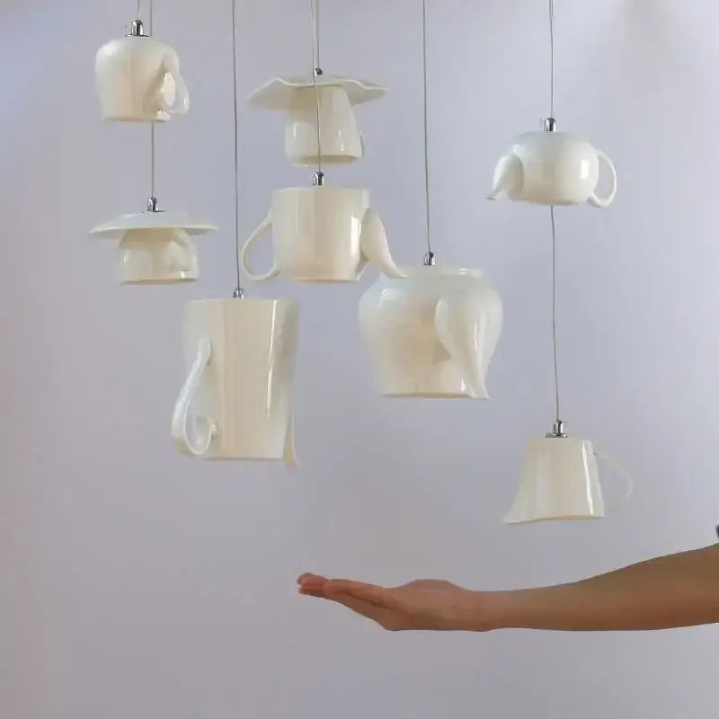 White ceramic teapot led pendant lights kitchen warm glow interior