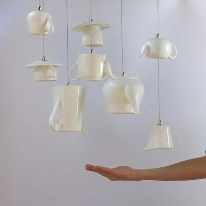 White ceramic teapot led pendant lights kitchen warm glow interior