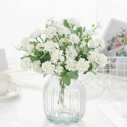White hydrangea bouquet in ribbed glass vase for living room decor
