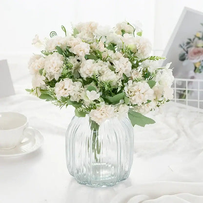 White hydrangea bouquet in ribbed glass vase for living room decor