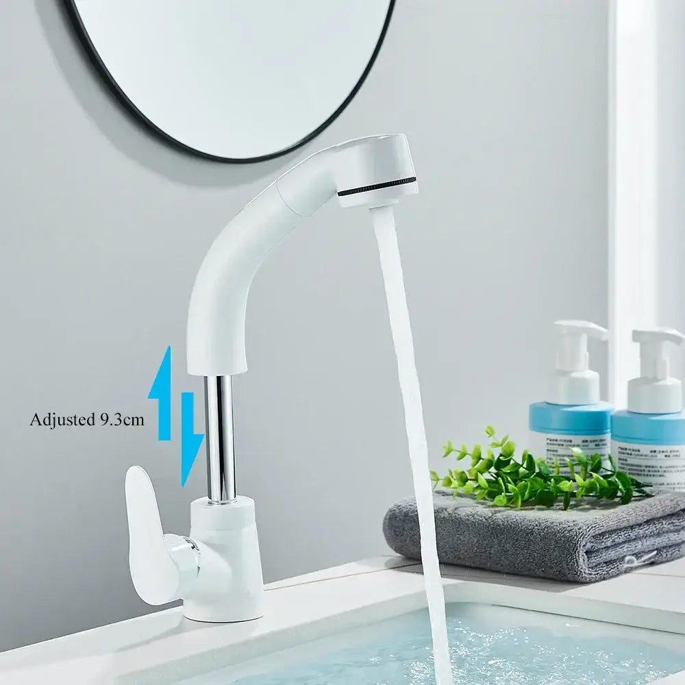 White plastic kitchen sink faucet with curved spout and single lever
