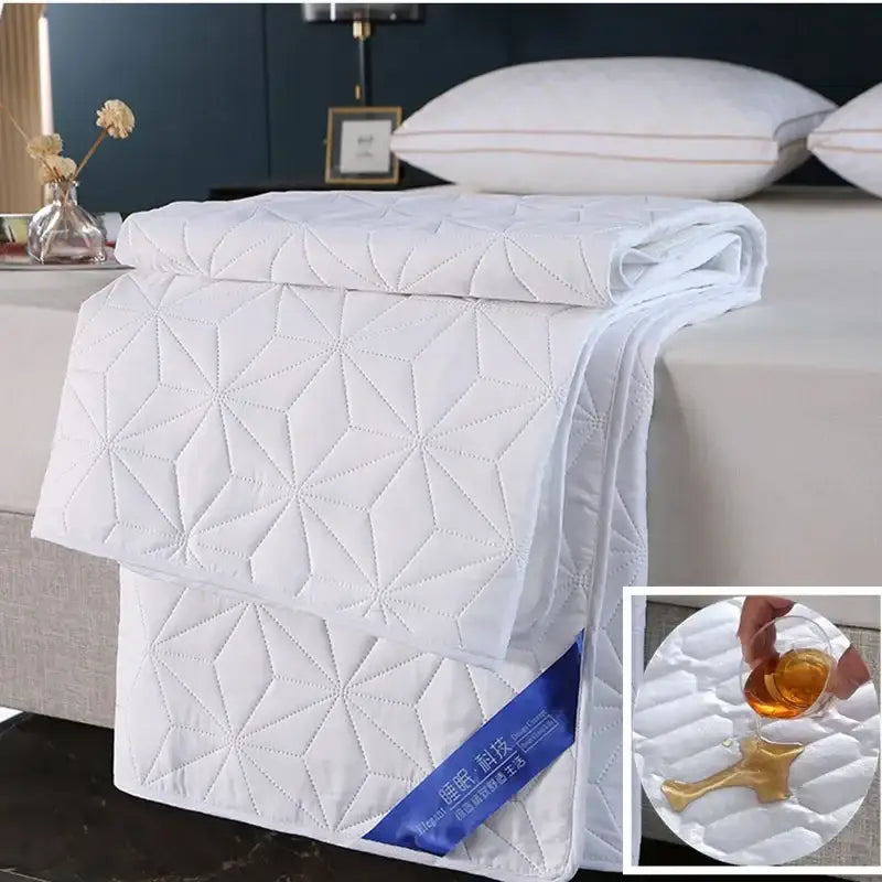 White quilted star pattern waterproof bed protector pad bedroom