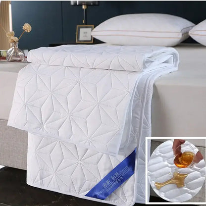 White quilted star pattern waterproof bed protector pad bedroom