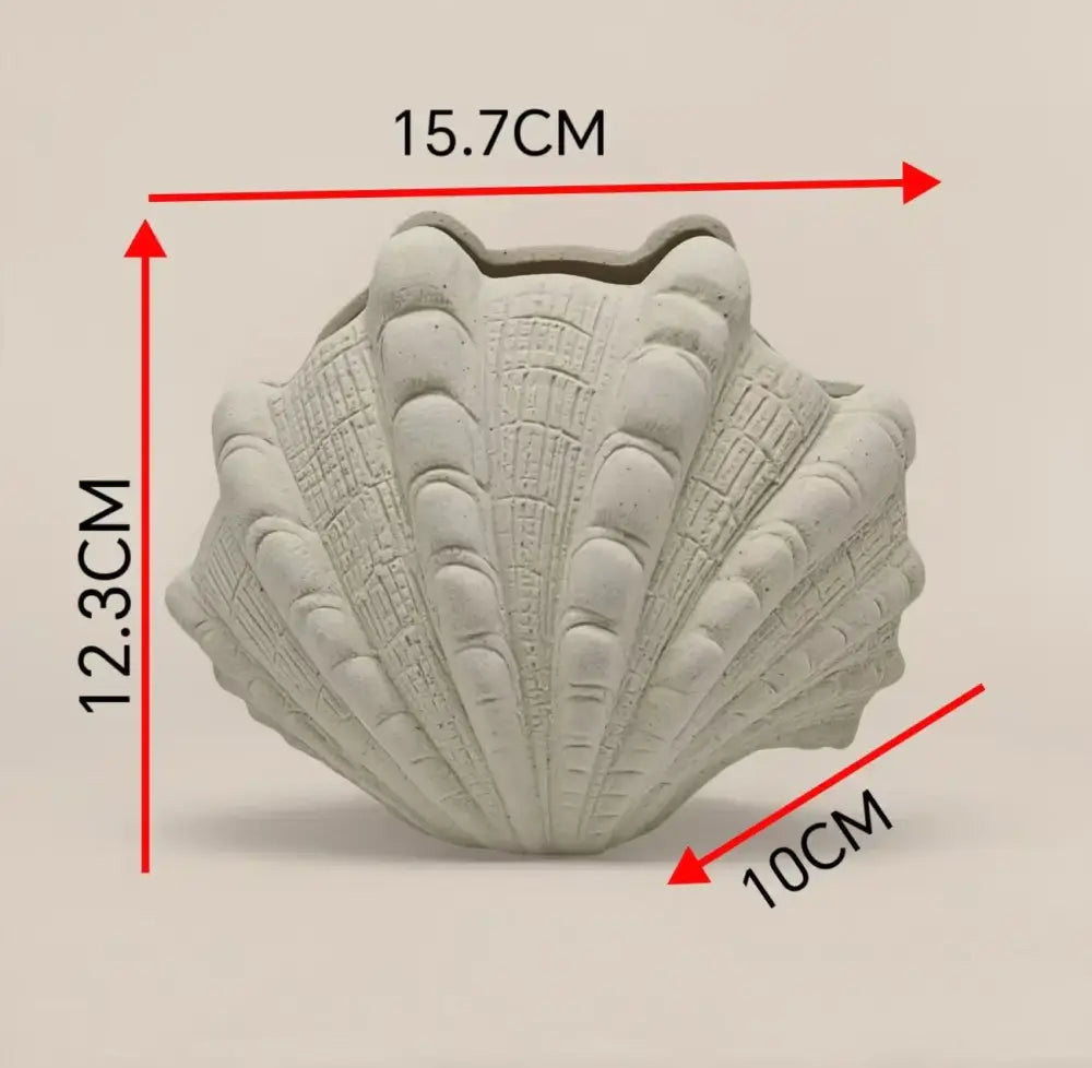 White ridged ceramic clam shell vase living room decor