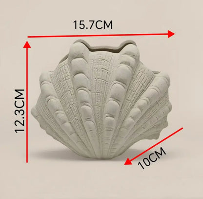 White ridged ceramic clam shell vase living room decor