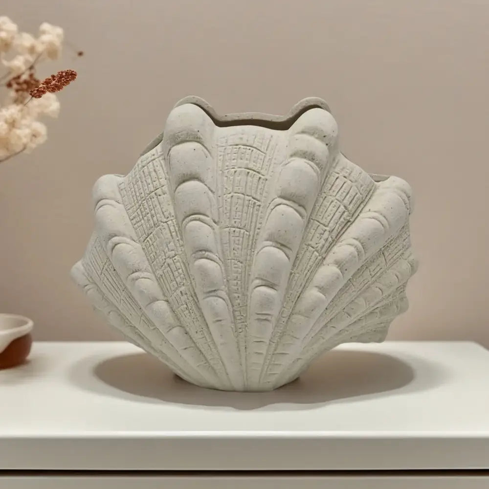 White ridged ceramic clam shell vase living room decor