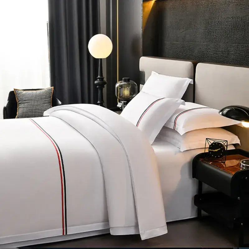 White satin bedding set with red & black trim bedroom decor