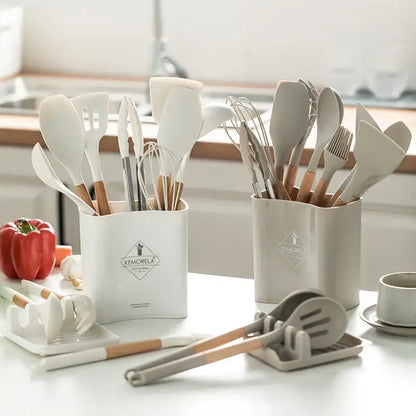 White silicone kitchen cookware set with wooden handles and holder