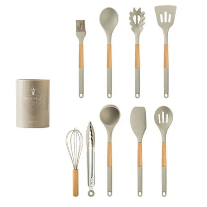 White silicone kitchen cookware set with wooden handles and holder