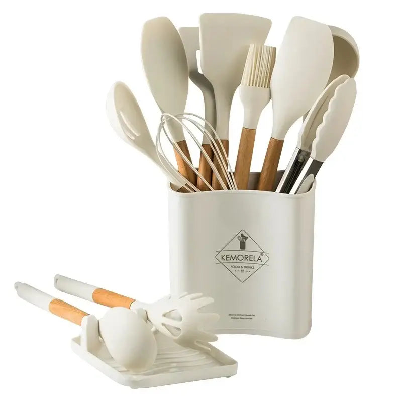 White silicone kitchen cookware set with wooden handles and holder