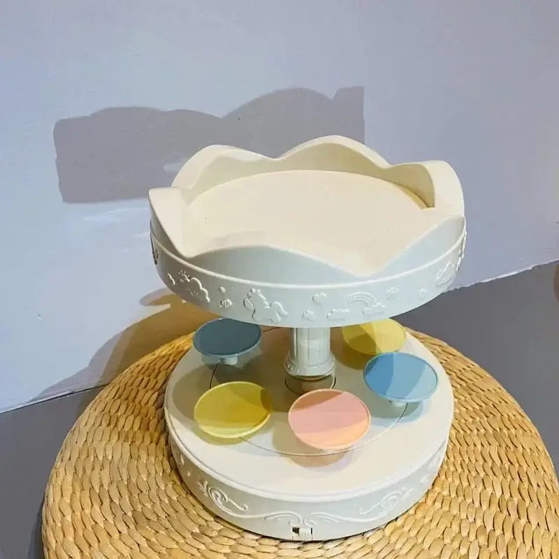 White two tiered rotating dessert table sushi machine dining room