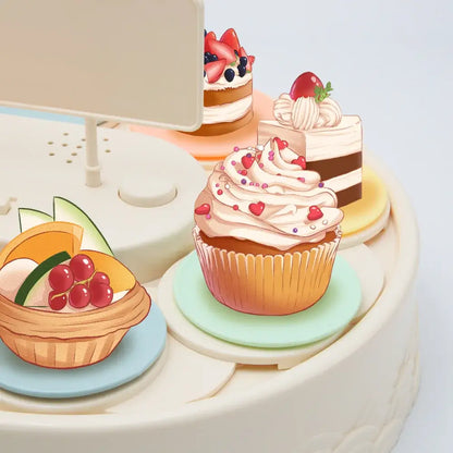 White two tiered rotating dessert table sushi machine dining room