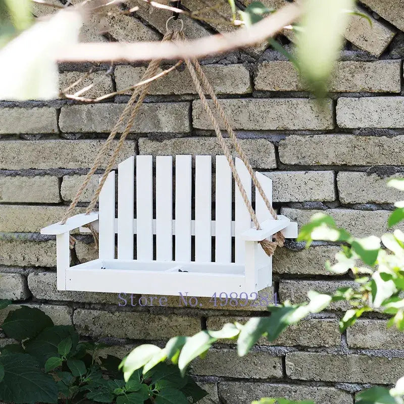 White wooden adirondack bird feeder chair garden decor