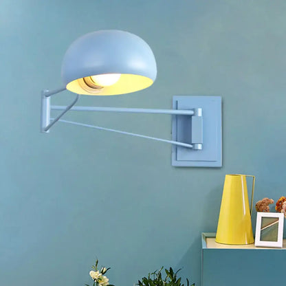 Yellow adjustable metal wall sconce with bowl shade for bedroom