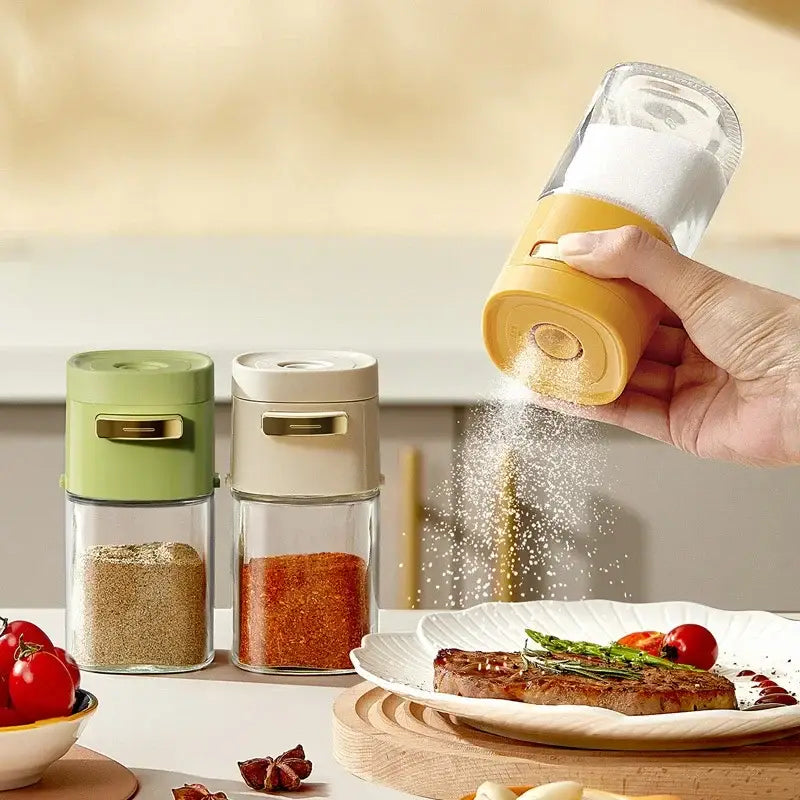 Yellow and clear glass spice dispenser kitchen salt grinder