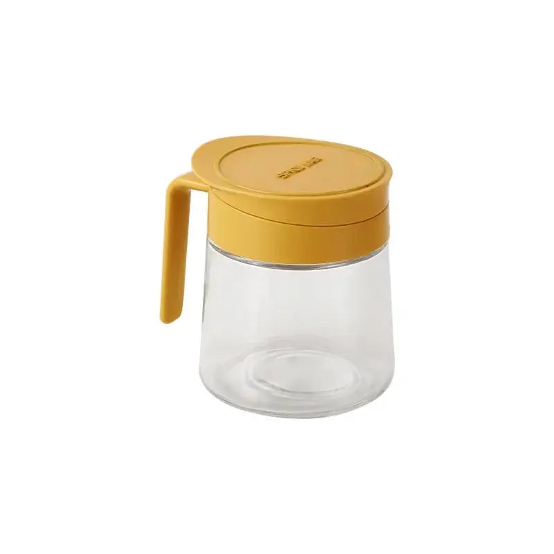 Yellow flip top glass seasoning jar with spoon kitchen spice shaker