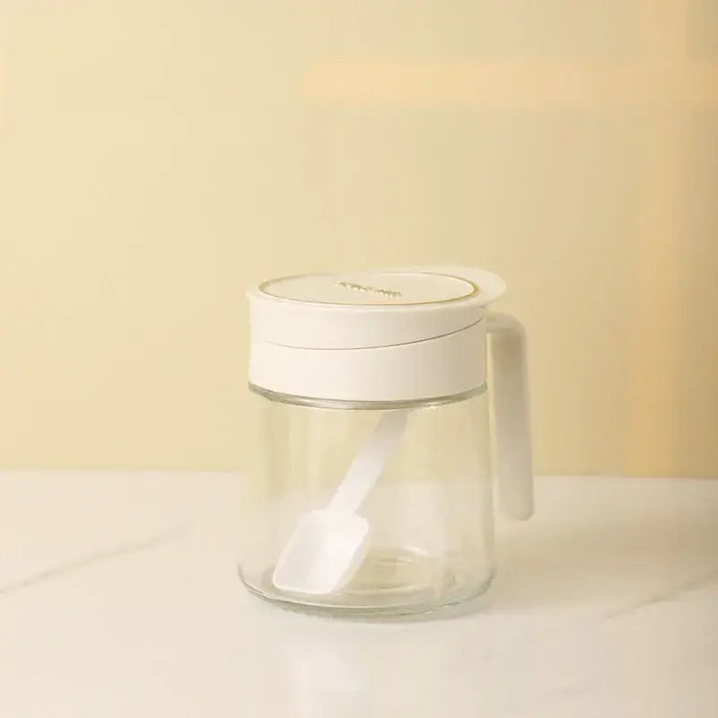 Yellow flip top glass seasoning jar with spoon kitchen spice shaker