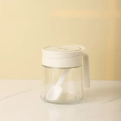 Yellow flip top glass seasoning jar with spoon kitchen spice shaker