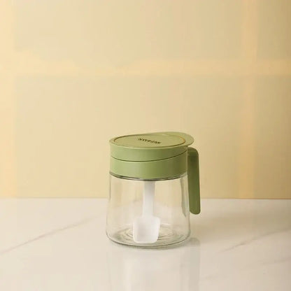 Yellow flip top glass seasoning jar with spoon kitchen spice shaker