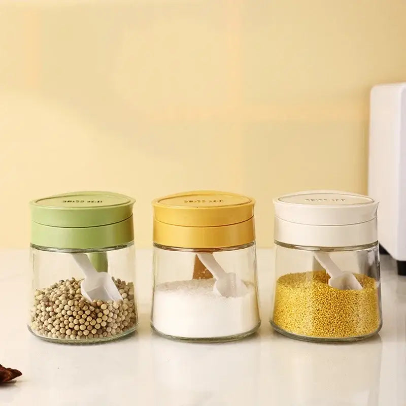 Yellow flip top glass seasoning jar with spoon kitchen spice shaker