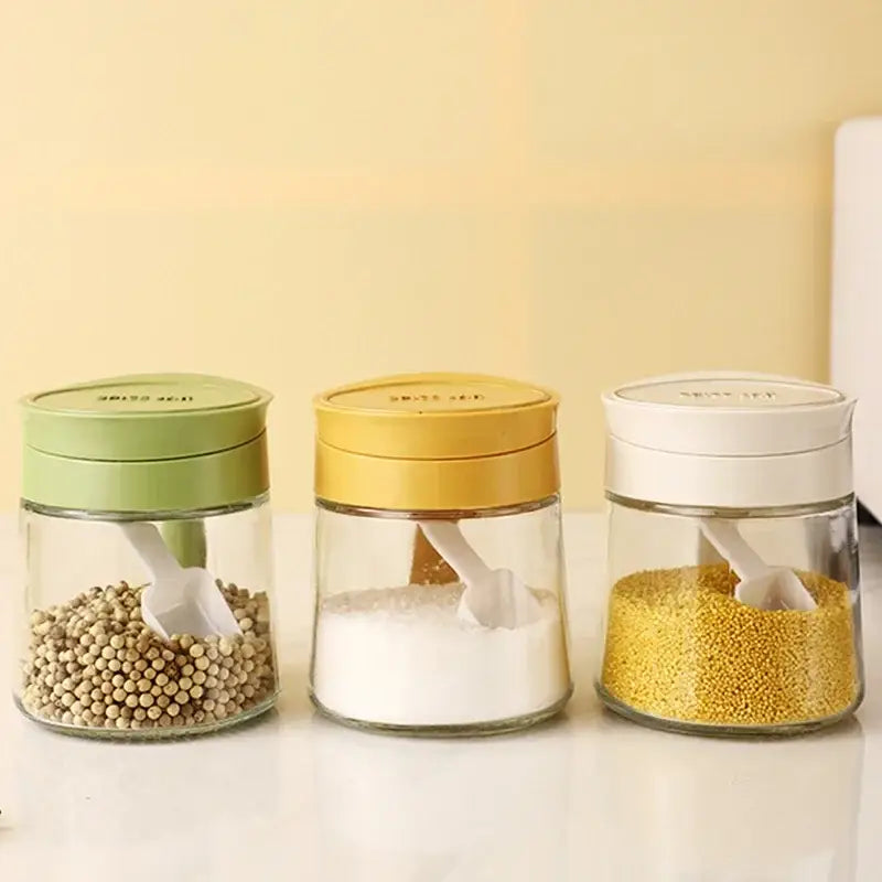 Yellow flip top glass seasoning jar with spoon kitchen spice shaker