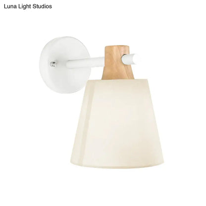 Yellow macaron fabric wall light with wood accent bedroom sconce