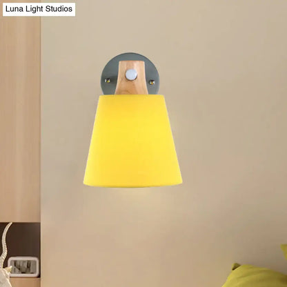 Yellow macaron fabric wall light with wood accent bedroom sconce