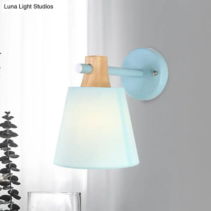 Yellow macaron fabric wall light with wood accent bedroom sconce