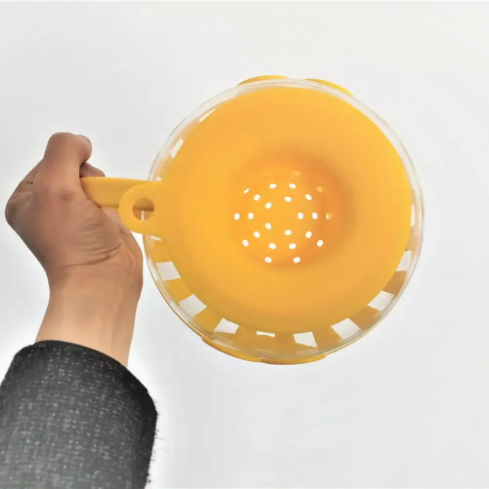 Yellow silicone and clear glass popcorn maker kitchen colander lid
